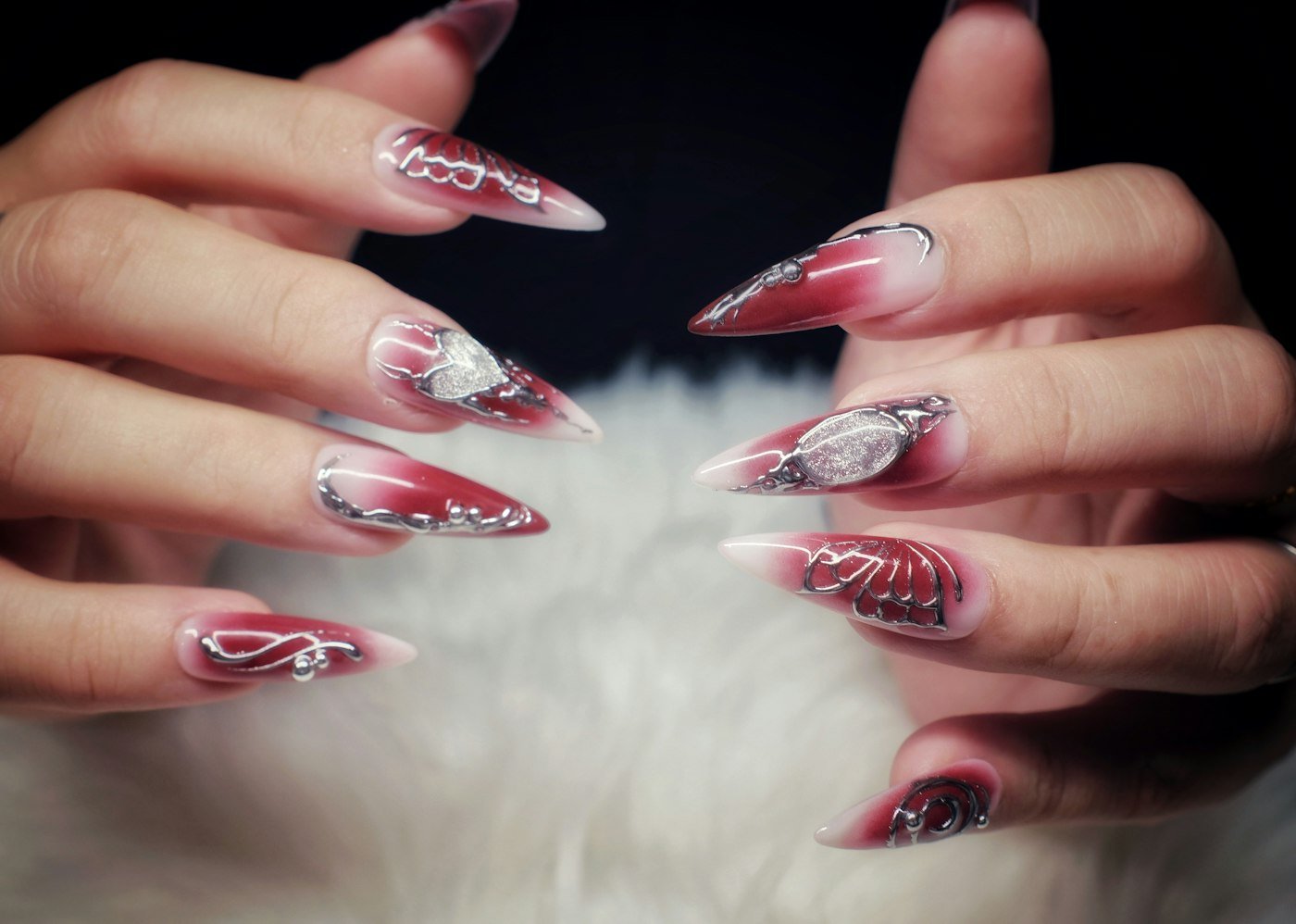 Long red and white stiletto extensions