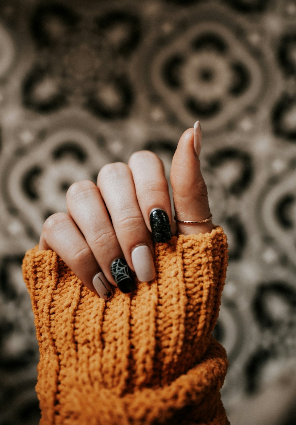 Nail art against a patterned background