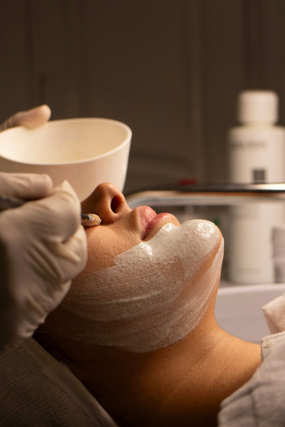 Woman relaxing during a facial