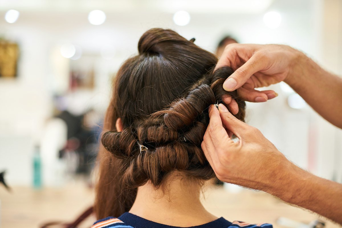 Hair being styled by hand