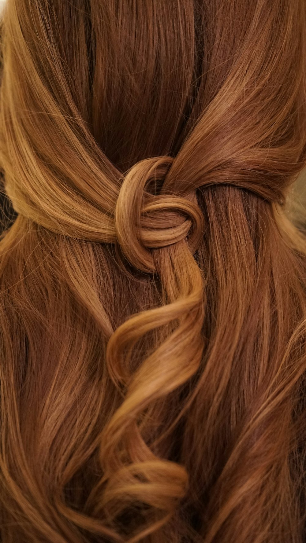 Auburn hair styled in a twist