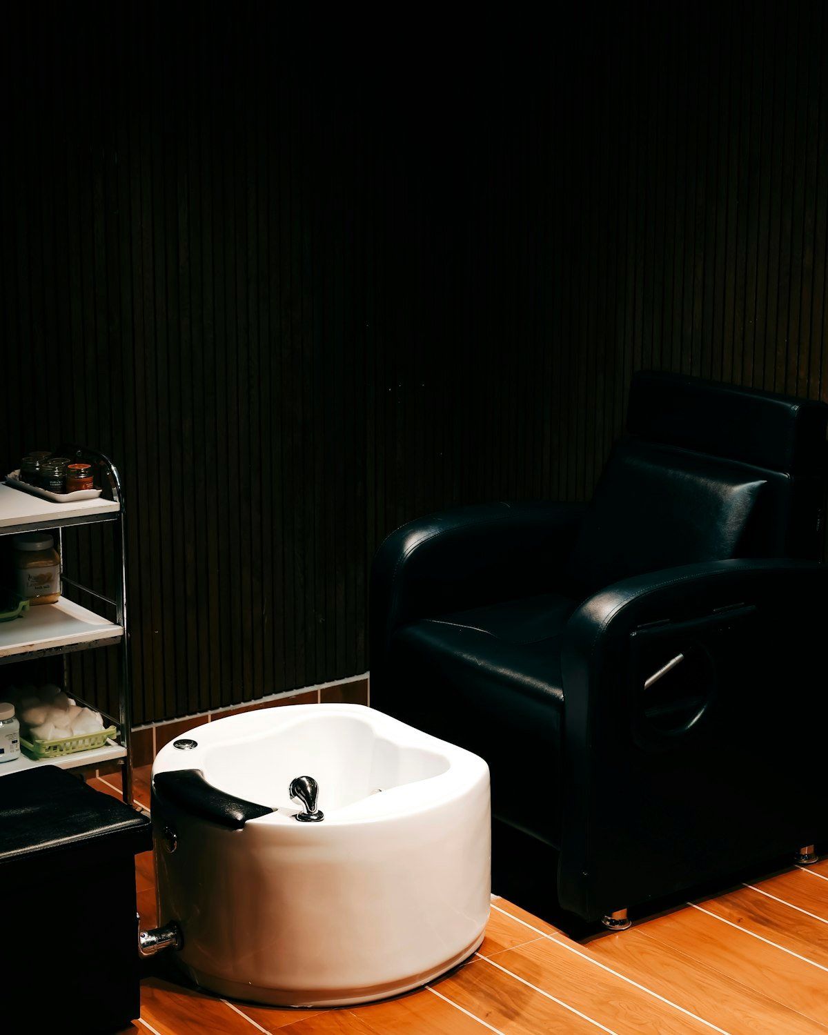 Pedicure chair and foot bath in a calm spa room