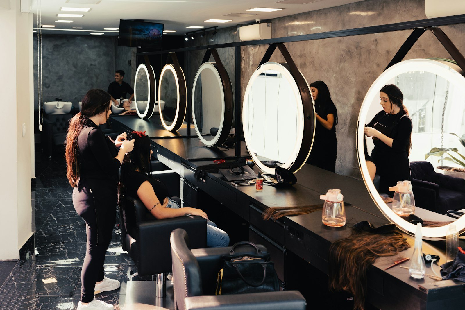 Stylish salon interior with mirrors and chairs