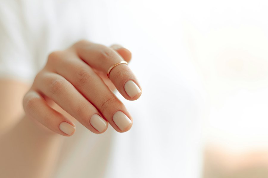 Neat nails with a soft white manicure